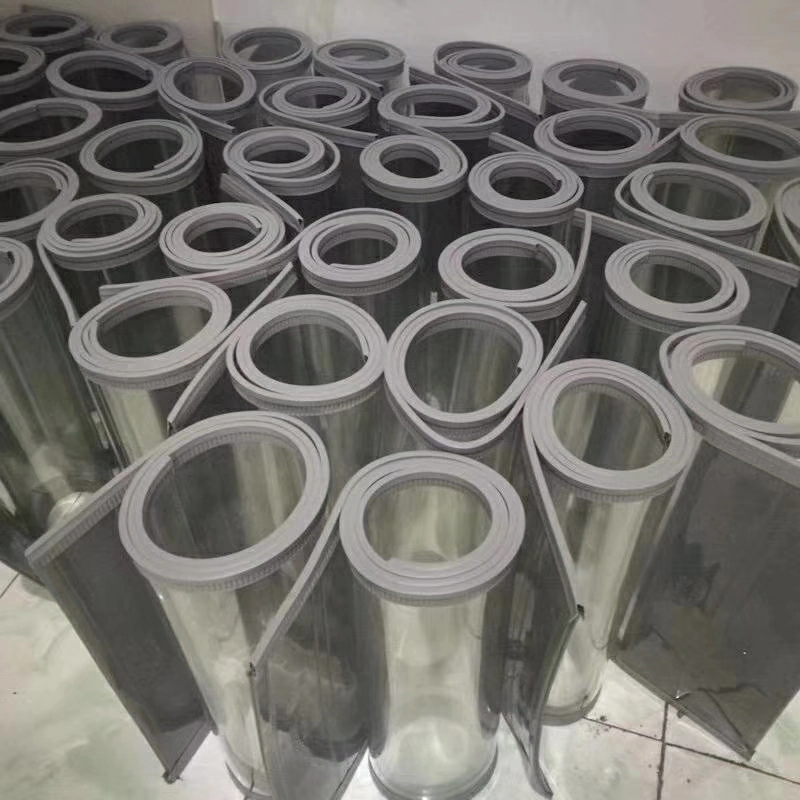 A close-up, detailed view of a single transparent PVC strip showing the embedded magnets along its edge.